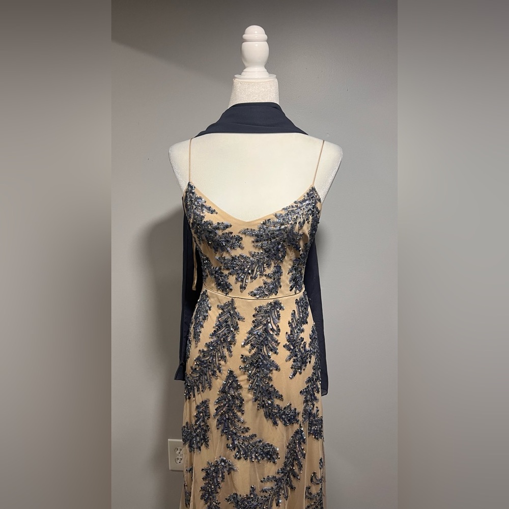Elegant Evening Gown with Blue Embroidery